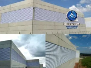 Solution Venezianas Industriais aplicadas em galpão industrial, oferecendo ventilação natural, conforto térmico e acabamento moderno para ambientes corporativos e industriais.